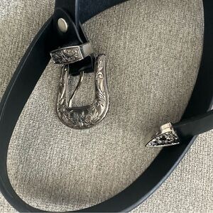 Silver buckler belt